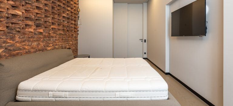 a mattress on a bed