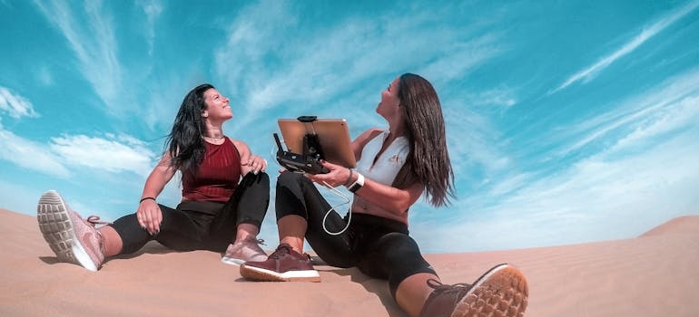 two friends with a drone