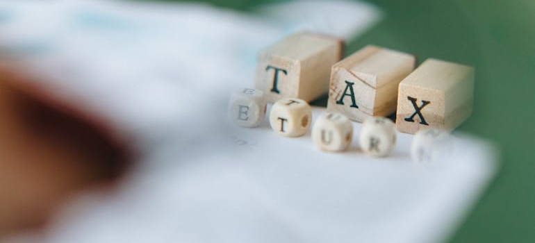 tax written on cube letters