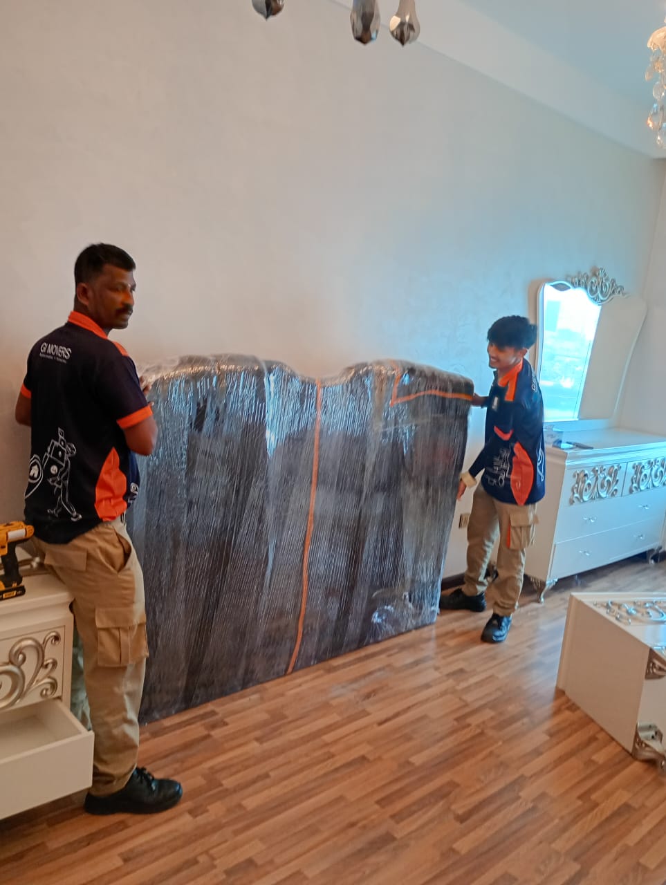 Professional movers packing belongings for a move in Shakhbout City, Abu Dhabi