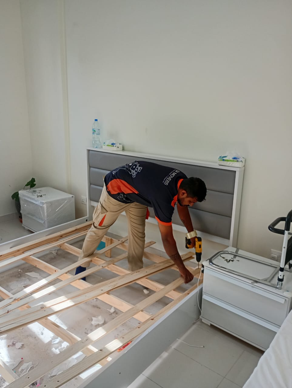 GI Movers team packing furniture for a Mirdif Dubai villa relocation