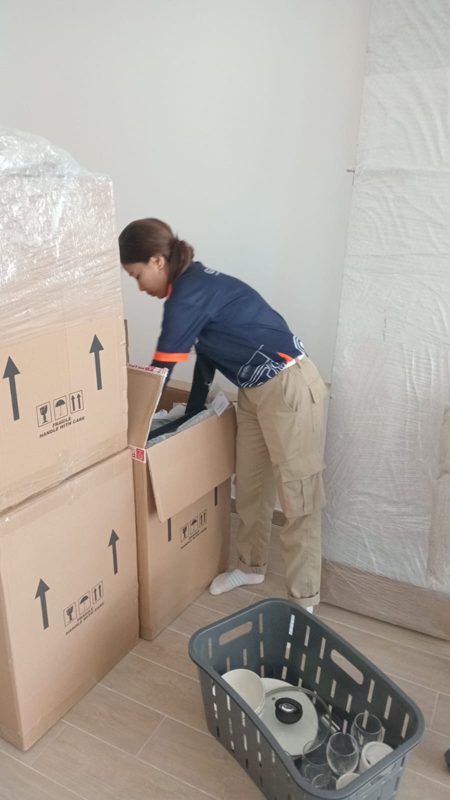 Professional movers packing belongings for a move in Zayed City, Abu Dhabi