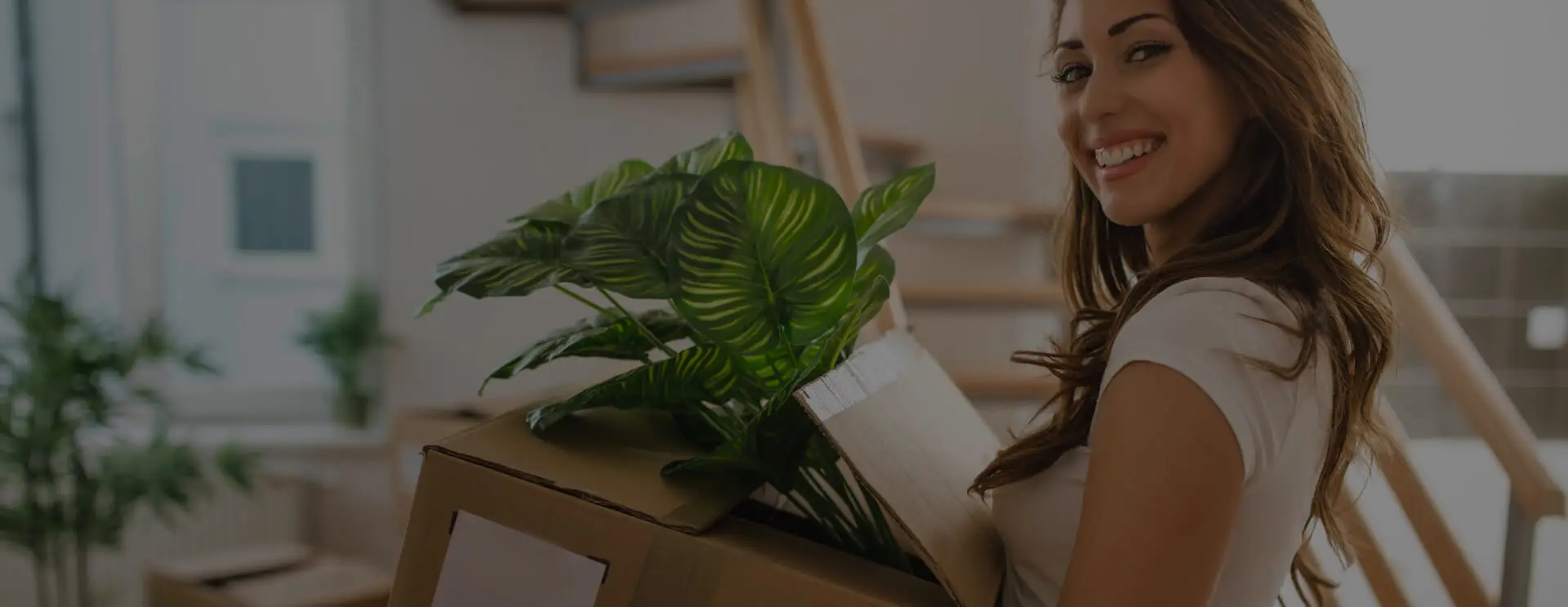 a woman waiting for the best movers in the uae