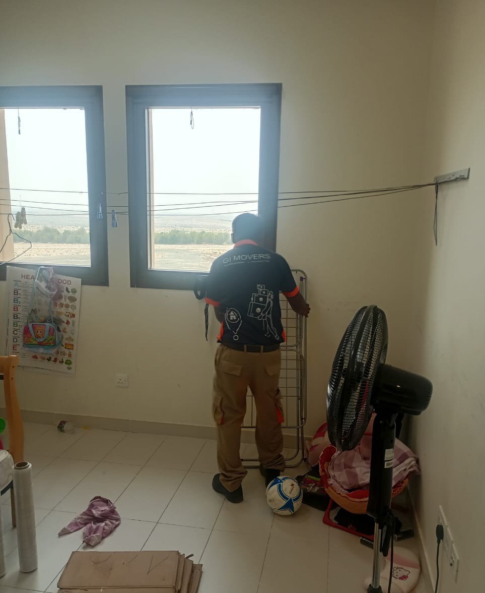GI Movers packer preparing an apartment move in Dubai